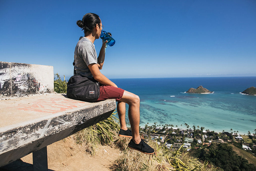 Serving as a lightweight shoulder/cross body bag on a hike in Hawaii